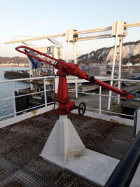 Man on boat against clear sky