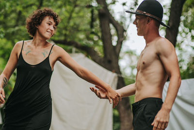 Young couple standing outdoors