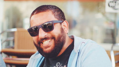 Portrait of young man wearing sunglasses