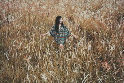 Young woman in field