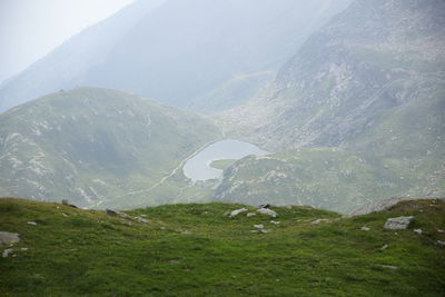 Scenic view of land against sky