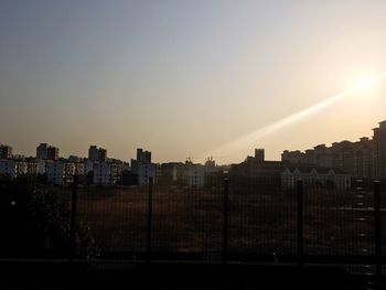 View of cityscape at sunset