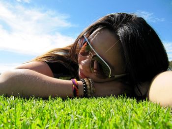 Close-up of dog on field