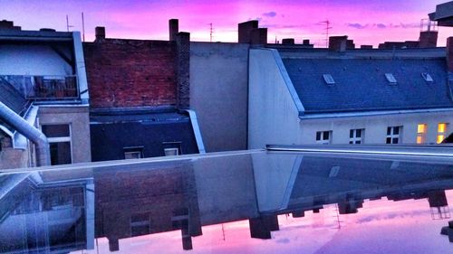 Reflection of buildings in puddle