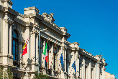 Low angle view of building against blue sky