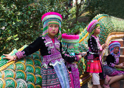 Low angle view of girl in traditional clothing