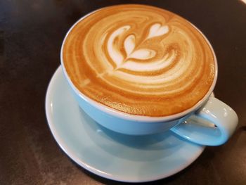 High angle view of cappuccino on table