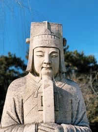 Statue of buddha against clear sky