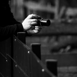 Midsection of person photographing