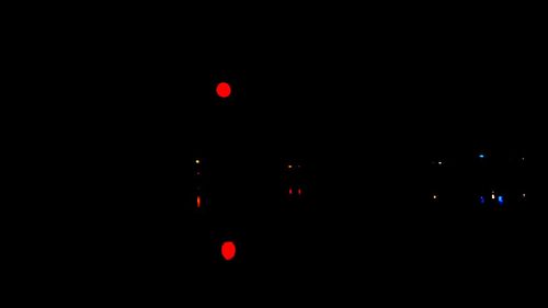 Close-up of illuminated lights at night