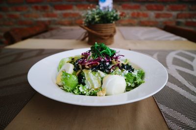 Close-up of salad in plate on table