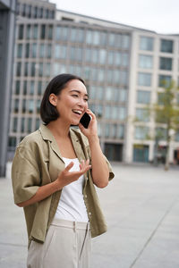 Young man using mobile phone