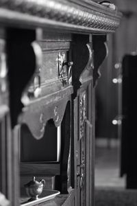 Close-up of wooden cabinet in room