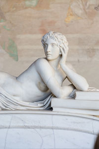 Close-up of statue against white wall