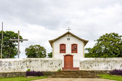 Exterior of old historic church against sky