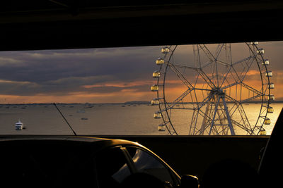 Close-up of silhouette ship against sky during sunset