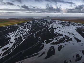 Aerial view of beach against sky