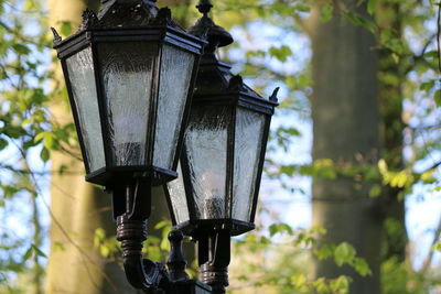 Low angle view of electric lamp on street