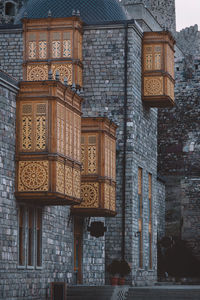 Low angle view of cross on building