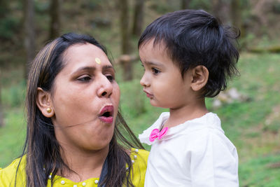 Portrait of mother and daughter
