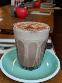 Close-up of coffee cup on table