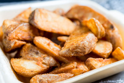 Close-up of fried potatoes in plate