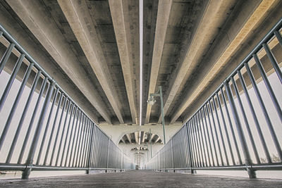 Walkway under bridge