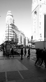 People in city against clear sky