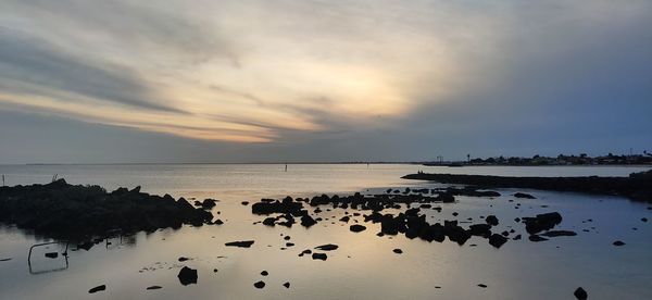 Scenic view of sea against sky during sunset