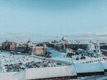 High angle view of city buildings during winter
