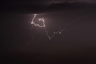 Lightning in sky at night