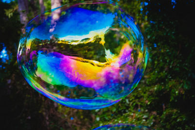 Close-up of rainbow over bubbles