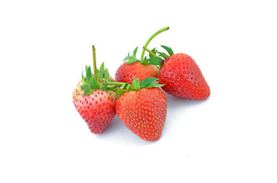 Close-up of strawberries against white background