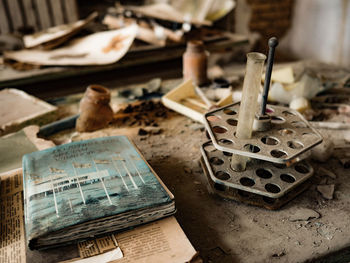 High angle view of old objects on table