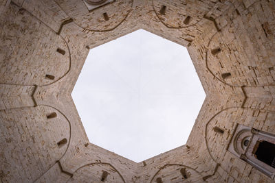 Low angle view of historical building castel del monte puglia italia 