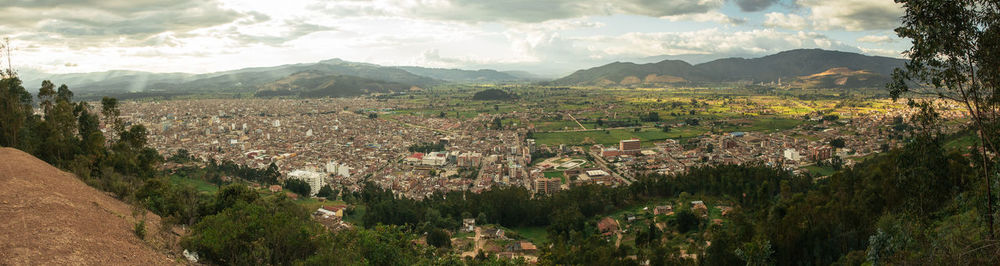 Panoramic shot of townscape against mountains