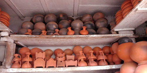 Clay pots for sale at market stall