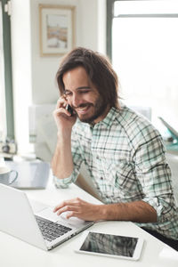 Mid adult man in office, new jersey, usa