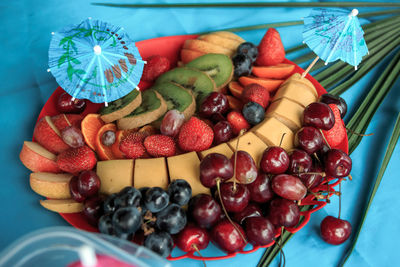 High angle view of fruits in plate on table