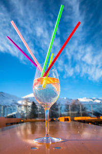 Close-up of wine against sky