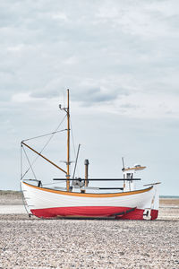 Boats in sea against sky