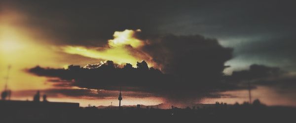 Scenic view of cloudy sky at sunset