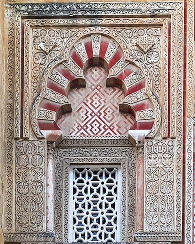 CLOSE-UP OF ORNATE WINDOW