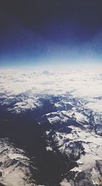 Scenic view of snow covered mountains