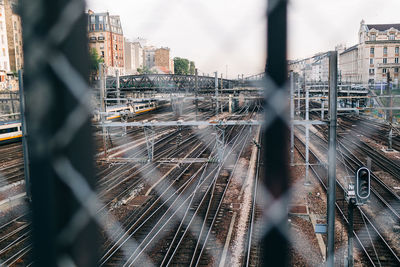 Train on railroad tracks in city