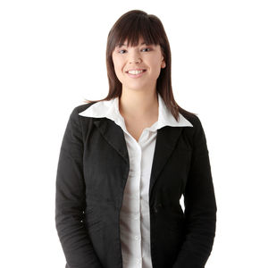 Portrait of a smiling young woman over white background
