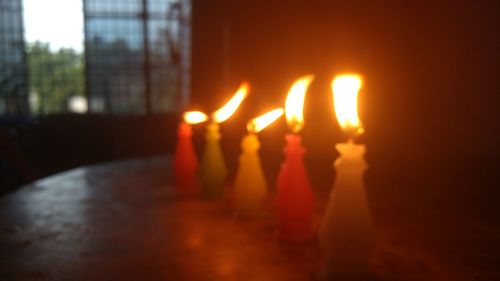 Close-up of burning candles