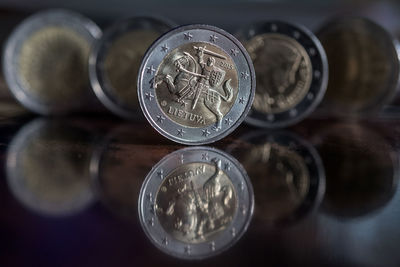 Close-up of coin on table