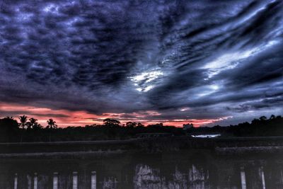 Scenic view of dramatic sky during sunset