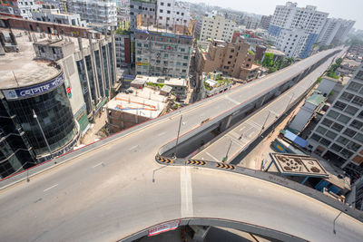 High angle view of street amidst buildings in city